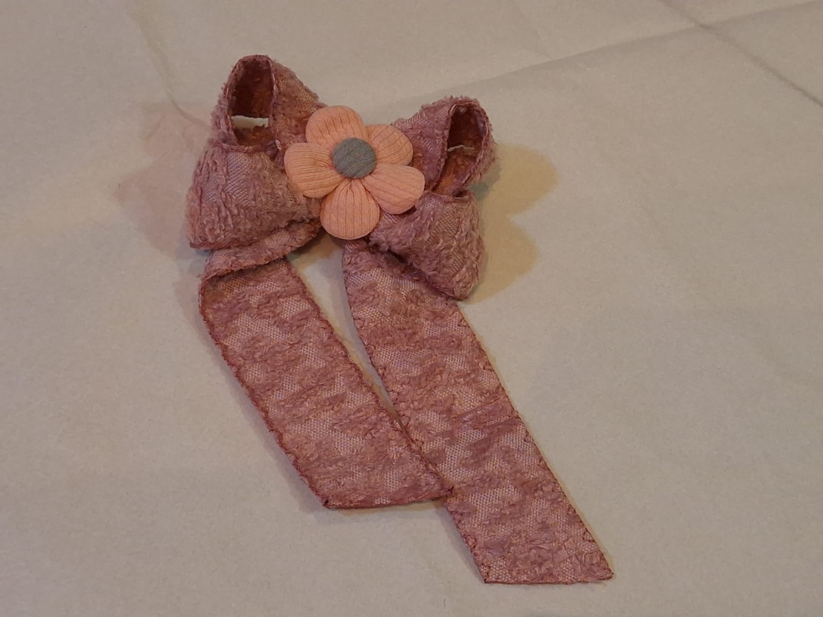 Laco com pontas rosa